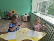 Аппликация "Солнышко и радуга".