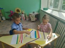 Аппликация "Солнышко и радуга".