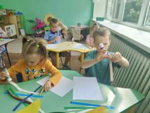Аппликация "Солнышко и радуга".