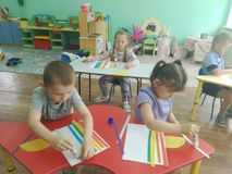 Аппликация "Солнышко и радуга".
